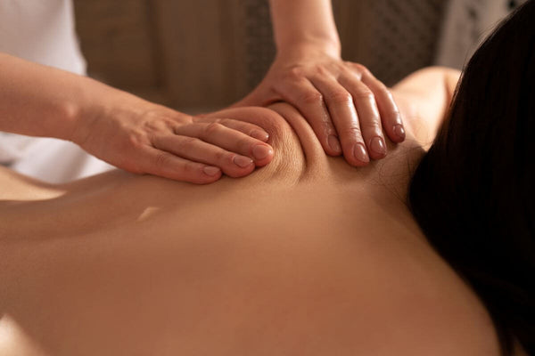 Woman getting Deep Tissue Massage