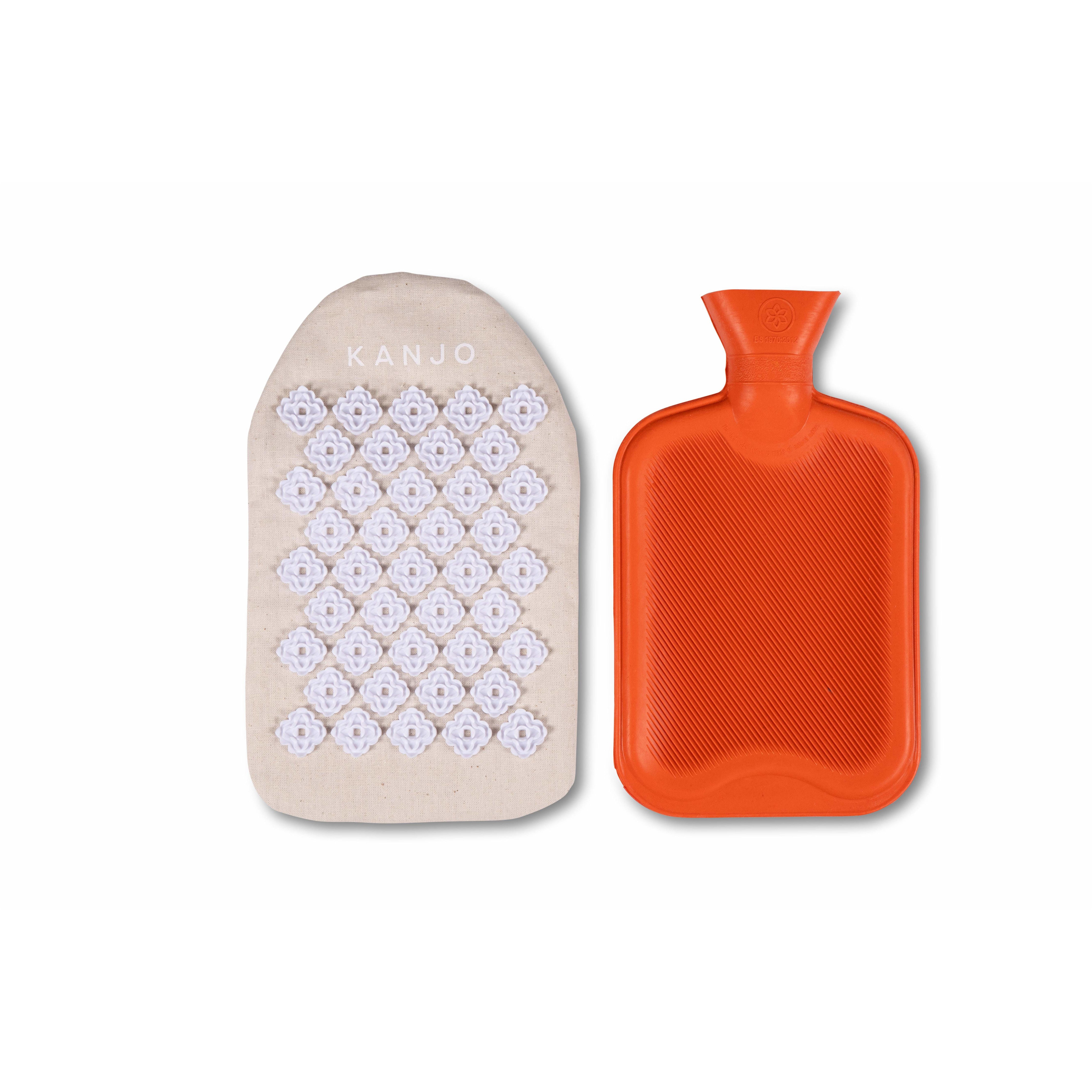 Kanjo acupressure pillow used with heat pack and posture awareness